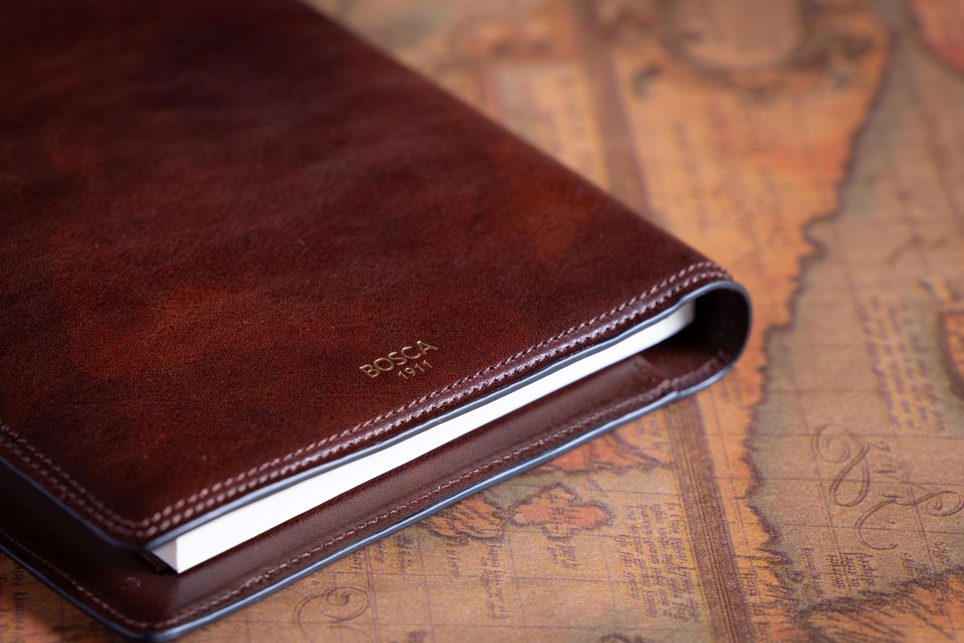 Zoomed in view of Bosca Brown Leather Journal